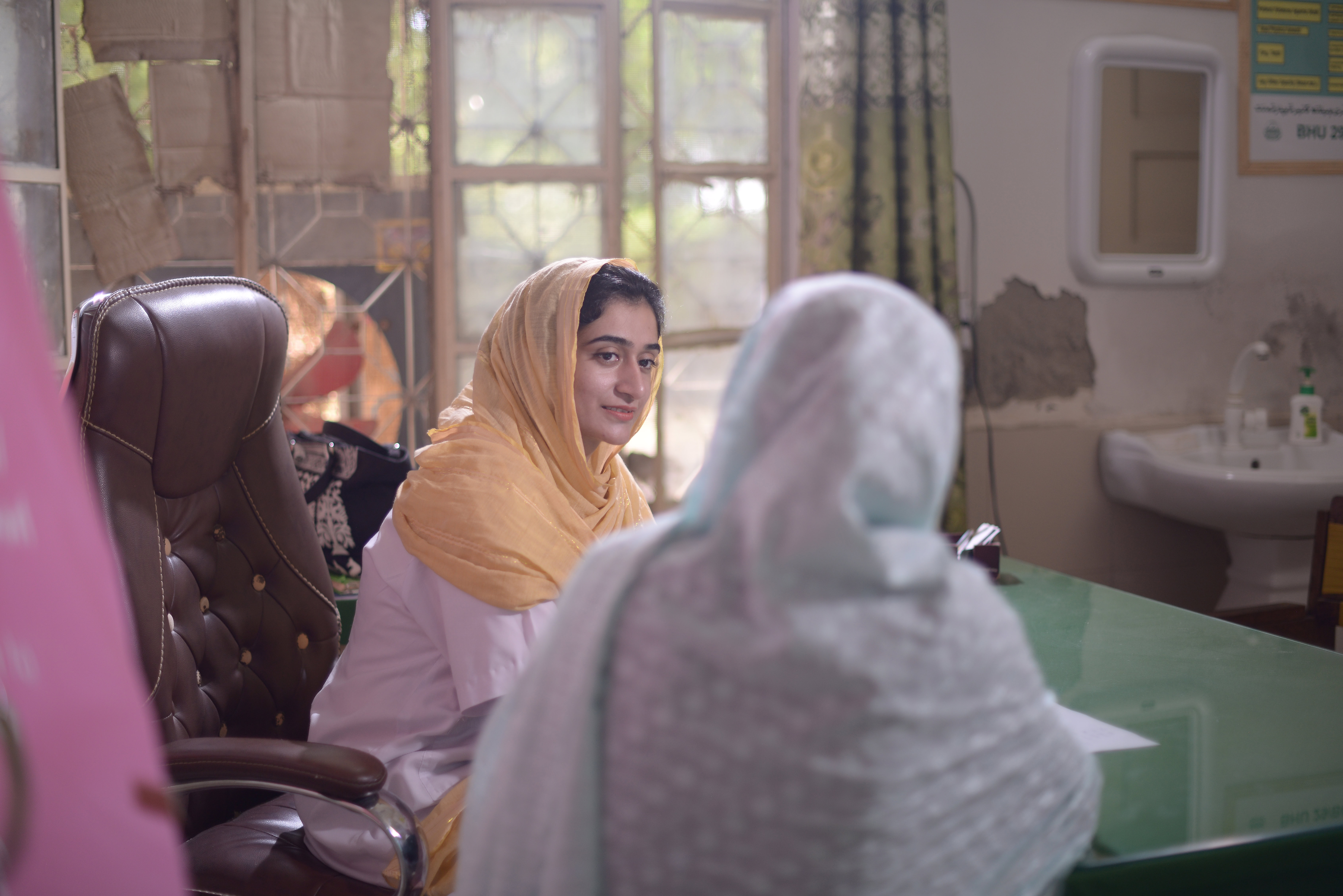 Two women speaking