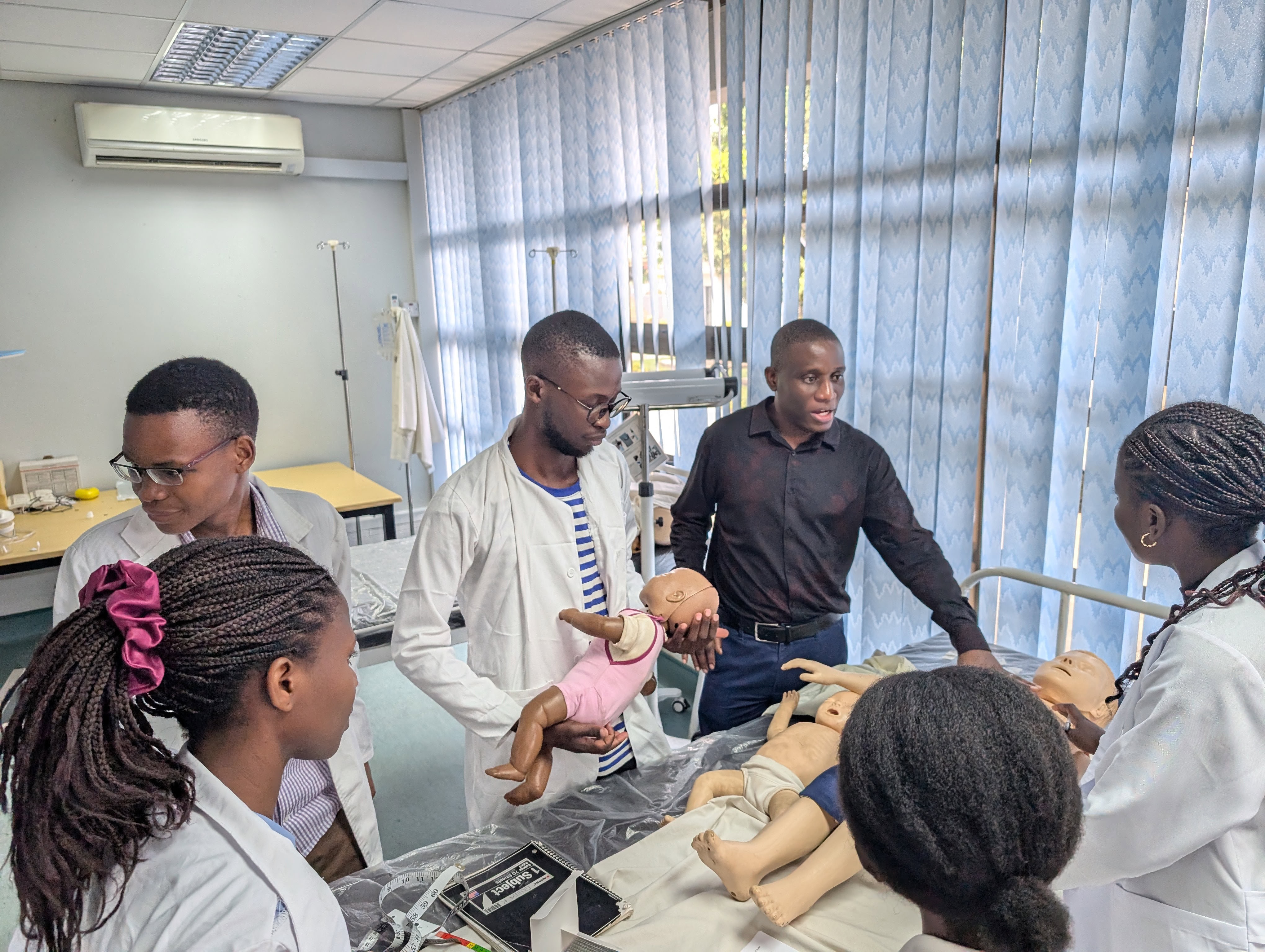 A group of students being instructed.